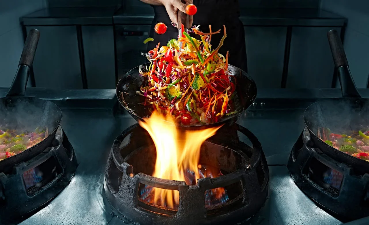 Banner promocional de wok que enlaza a productos de máquinas de hostelería especializadas para restaurantes de wok.